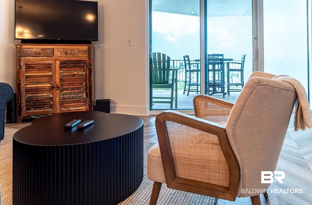 27800 Canal Road, Unit 212 Orange Beach, AL 36561 - Photo 20 of 43 Living area with baseboards