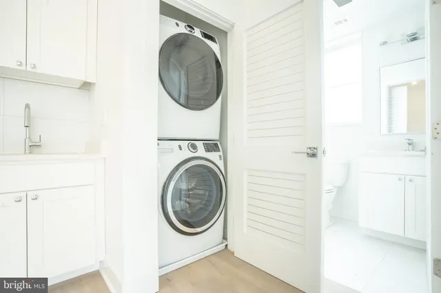 a utility room with dryer and washer