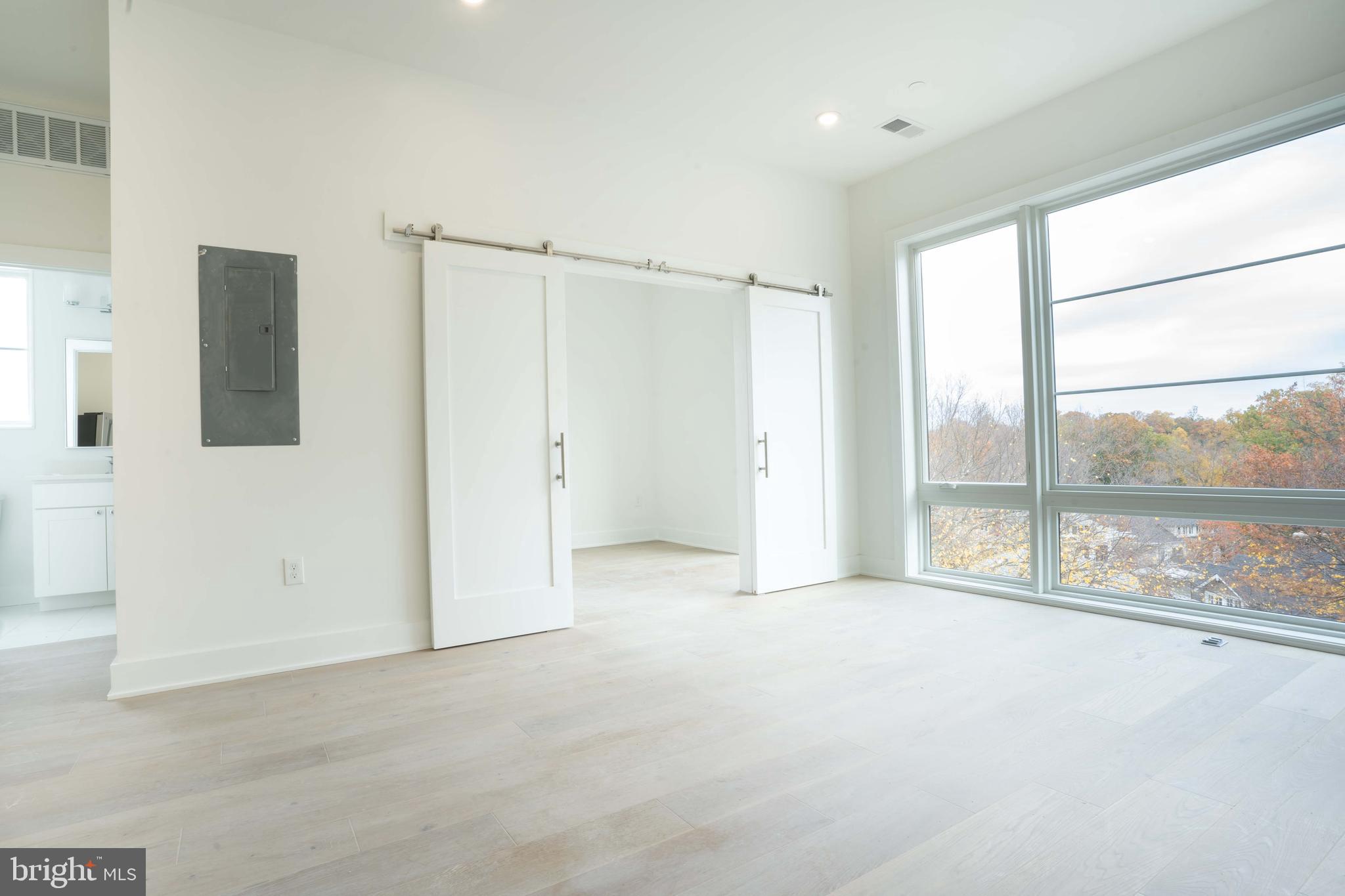 5301 Connecticut Avenue Northwest, Unit 403 Washington, DC 20015 - Photo 4 of 12 a view of an empty room with a window