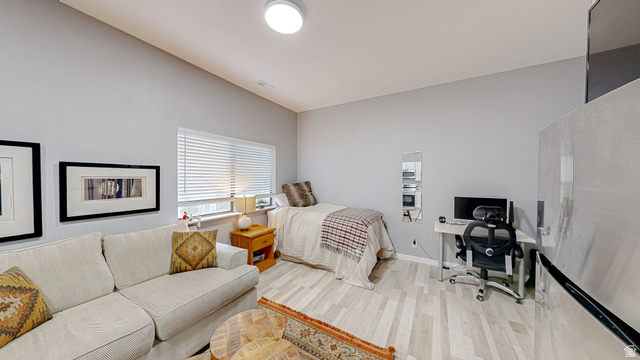 630 1100 West Provo, UT 84601 - Photo 7 of 64 Bright interior space featuring light-toned wood-finish flooring
