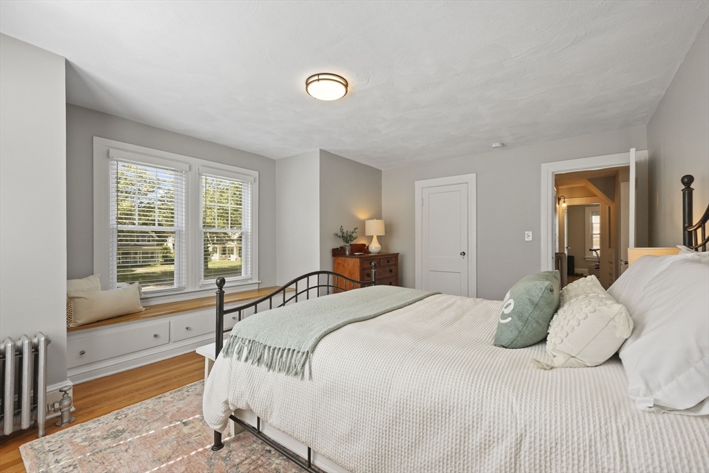 77 Longmeadow Street Longmeadow, MA 01106 - Photo 26 of 41 a bedroom with a bed and a large window