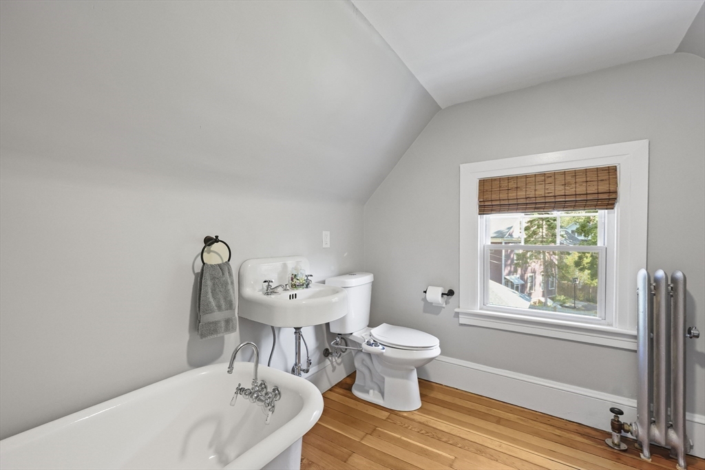 77 Longmeadow Street Longmeadow, MA 01106 - Photo 31 of 41 a bathroom with a sink toilet and a window