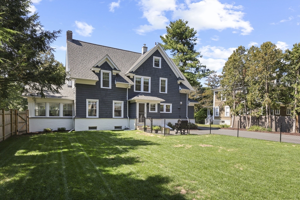 77 Longmeadow Street Longmeadow, MA 01106 - Photo 36 of 41 a front view of a house with a yard