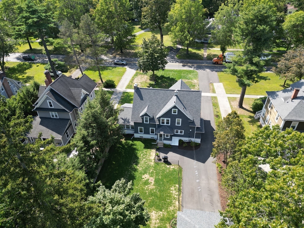 77 Longmeadow Street Longmeadow, MA 01106 - Photo 38 of 41 an aerial view of a house with a garden and swimming pool