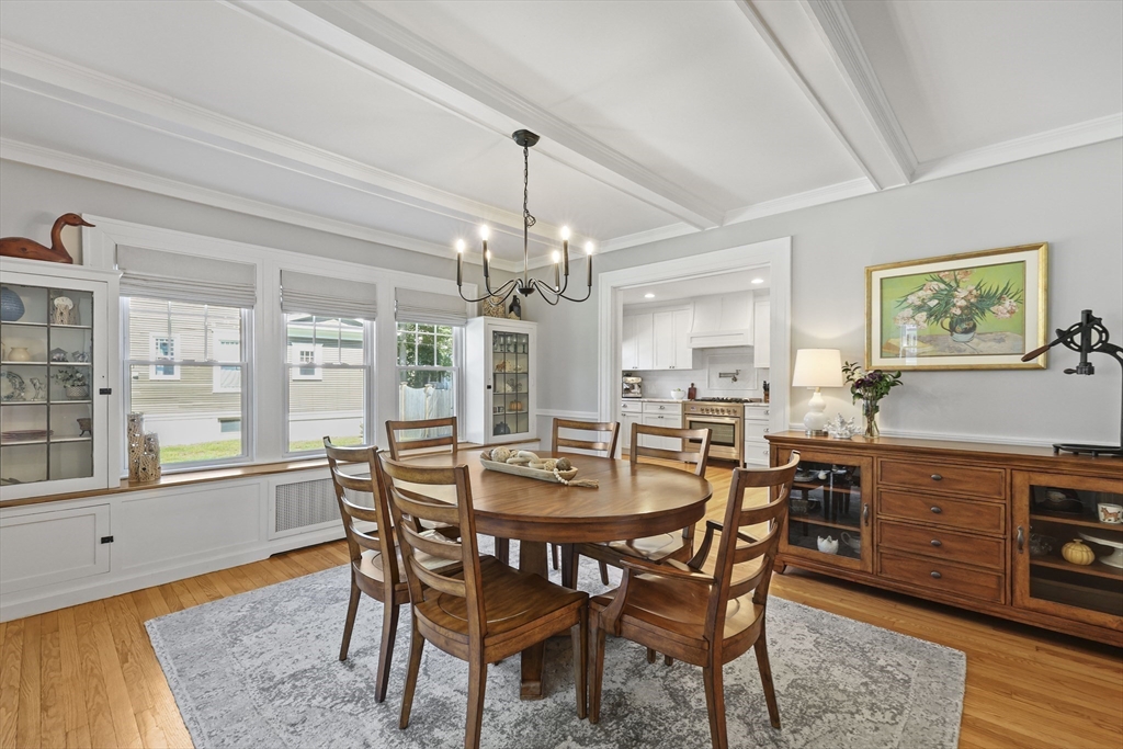 77 Longmeadow Street Longmeadow, MA 01106 - Photo 4 of 41 a dining room with furniture a chandelier and wooden floor