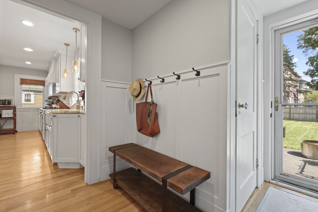 77 Longmeadow Street Longmeadow, MA 01106 - Photo 10 of 41 a view of a hallway with workspace and a mirror