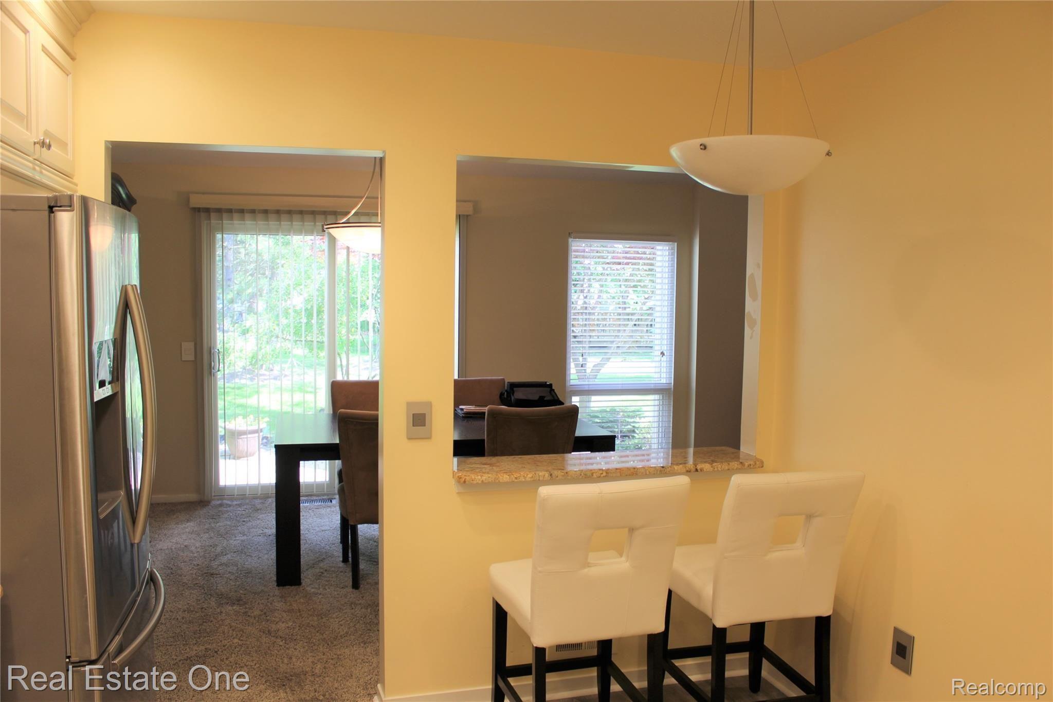 744 Eastbridge Court, Unit 103 Rochester, MI 48307 - Photo 4 of 23 Breakfast Bar.JPG