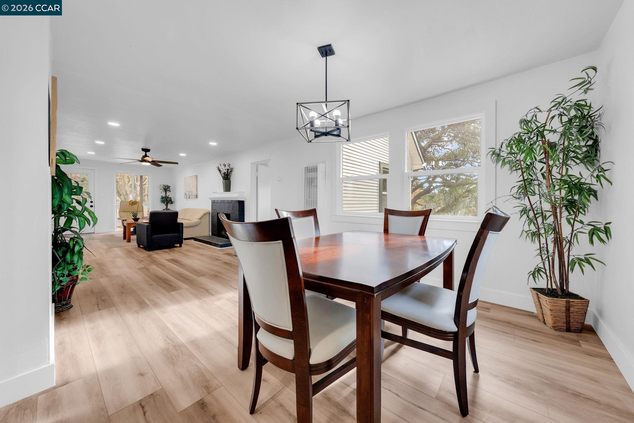 2699 Vale Road San Pablo, CA 94806 - Photo 8 of 30 a view of a dining room with furniture and wooden floor