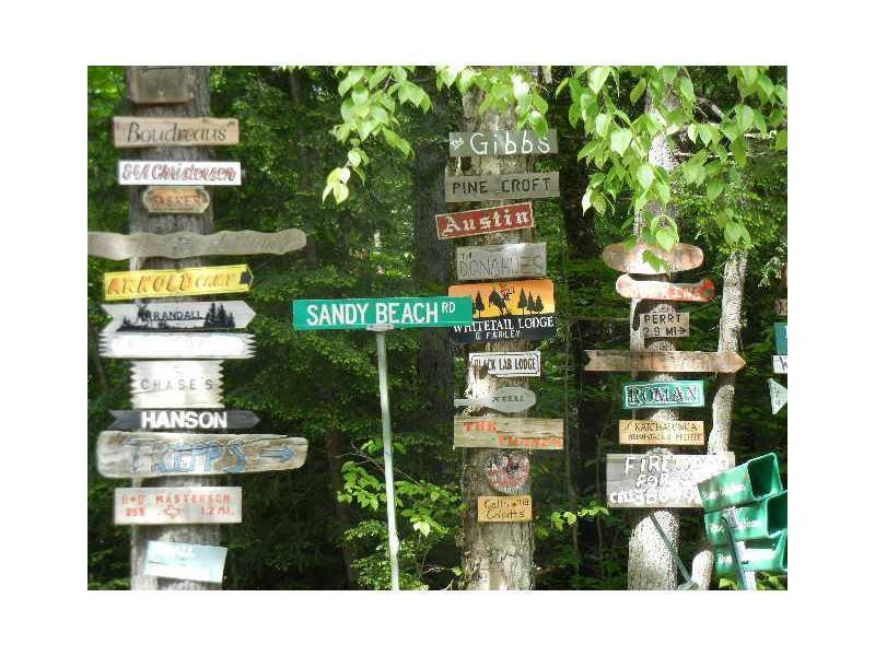 92 Sandy Beach Road Danforth, ME 04424 - Photo 13 of 22 Exterior Front. Signs at Sandy Beach...