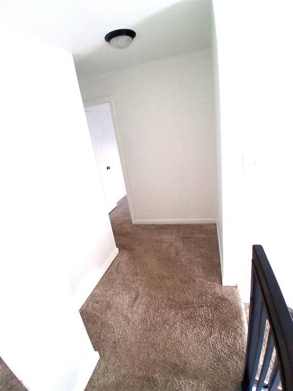 2718 South University Drive, Unit 17B Fort Lauderdale, FL 33328 - Photo 14 of 28 a view of a hallway with staircase
