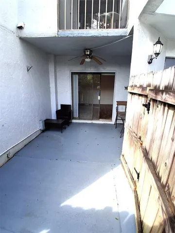 a view of a livingroom with furniture and a fireplace