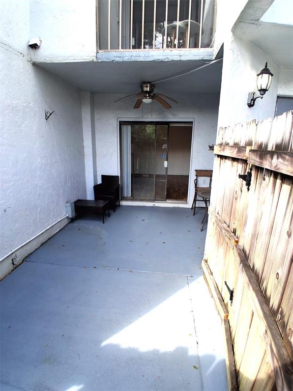 2718 South University Drive, Unit 17B Fort Lauderdale, FL 33328 - Photo 17 of 28 a view of a livingroom with furniture and a fireplace