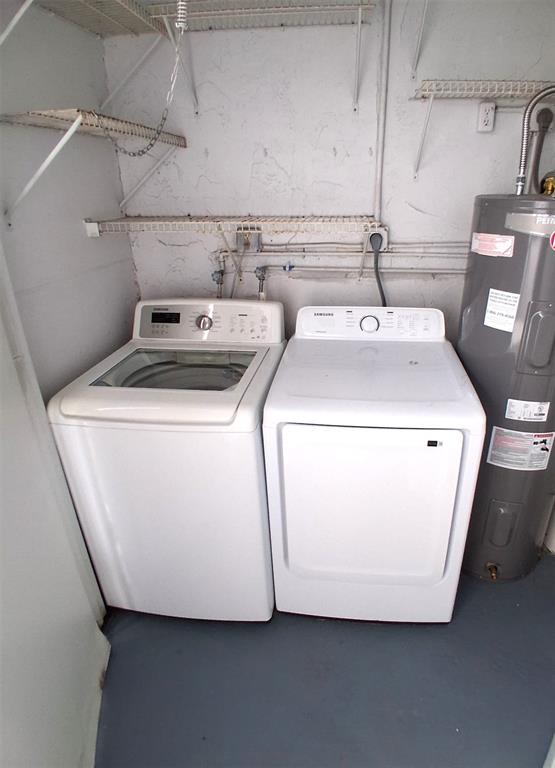 2718 South University Drive, Unit 17B Fort Lauderdale, FL 33328 - Photo 19 of 28 a utility room with dryer and washer