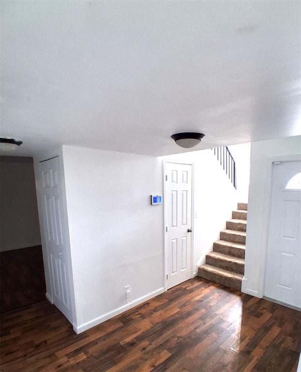 2718 South University Drive, Unit 17B Fort Lauderdale, FL 33328 - Photo 25 of 28 a view of a livingroom with wooden floor and stairs