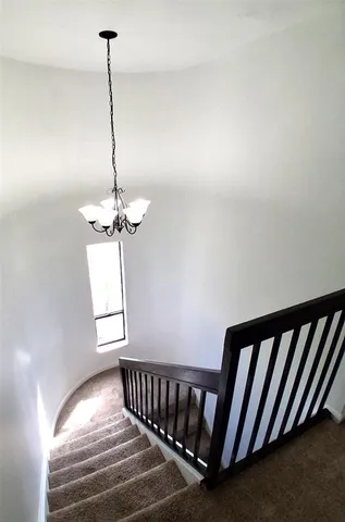 a view of empty room with windows