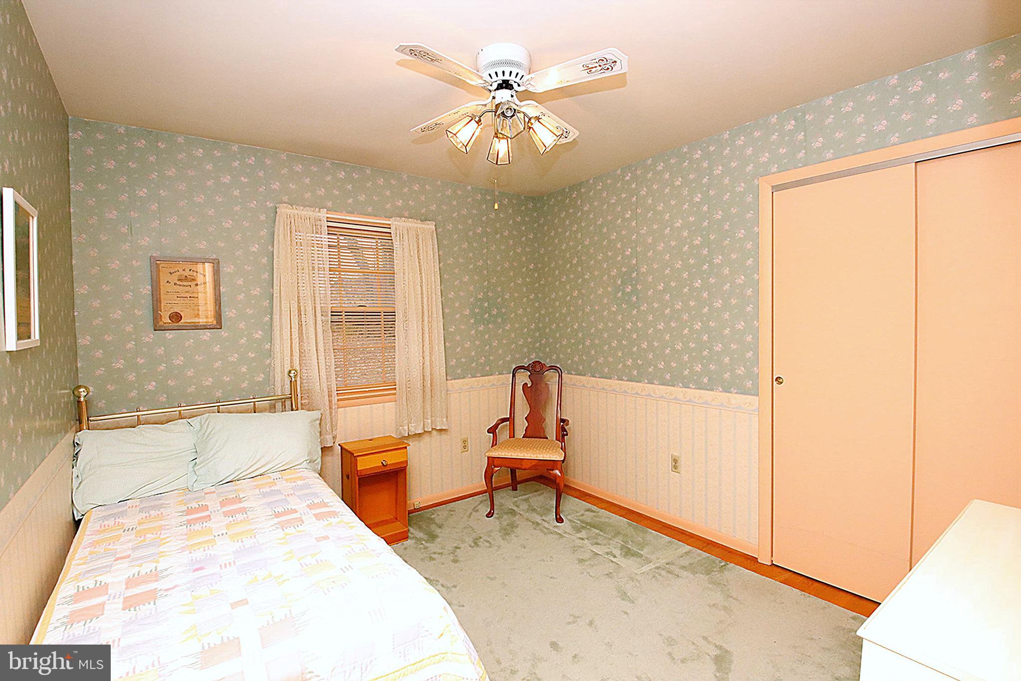 414 Beaver Creek Road Hagerstown, MD 21740 - Photo 19 of 33 a living room with furniture and a large window
