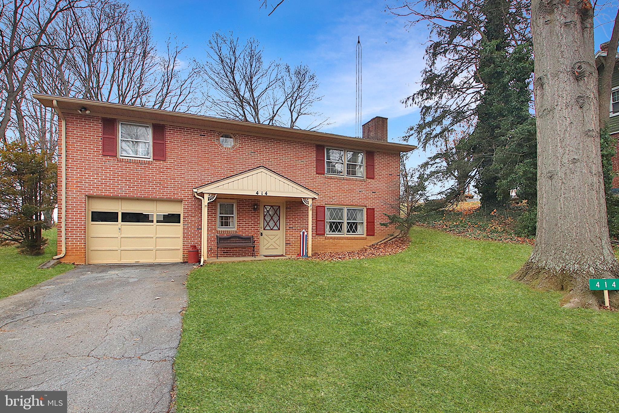 414 Beaver Creek Road Hagerstown, MD 21740 - Photo 2 of 33 a front view of a house with yard
