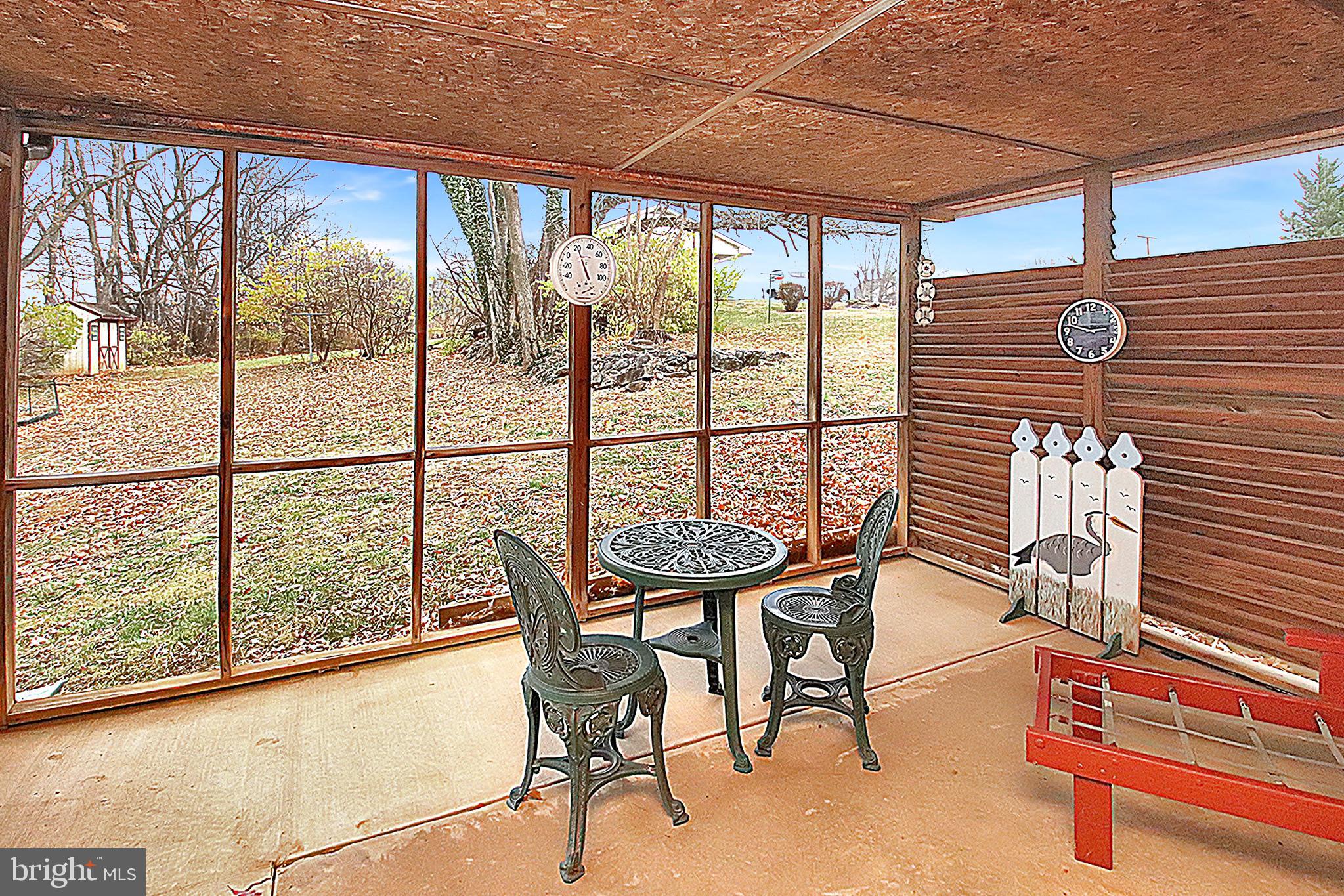 414 Beaver Creek Road Hagerstown, MD 21740 - Photo 29 of 33 a view of a dining room with furniture window and outside view