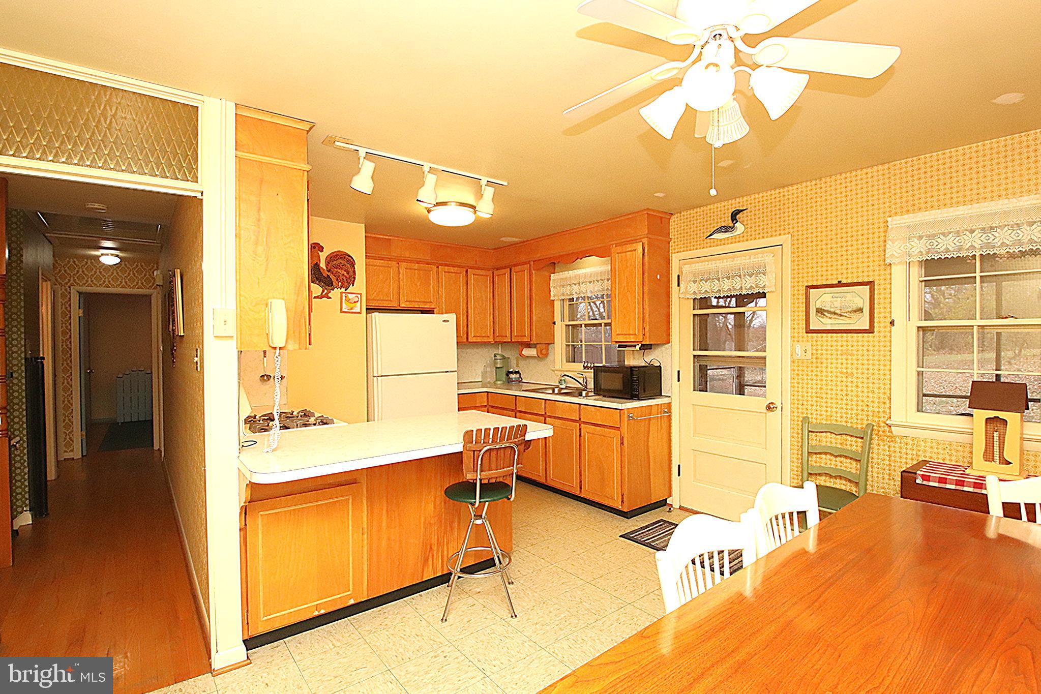 414 Beaver Creek Road Hagerstown, MD 21740 - Photo 8 of 33 a room with gym equipment and view of living room