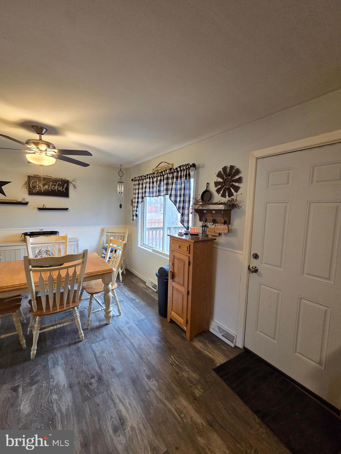 64 Rosedale Drive Bridgeton, NJ 08302 - Photo 7 of 16 a dining room with furniture and wooden floor
