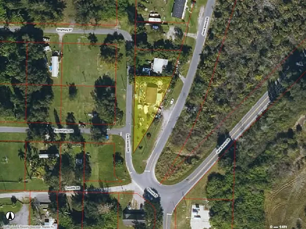 an aerial view of a residential houses with outdoor space
