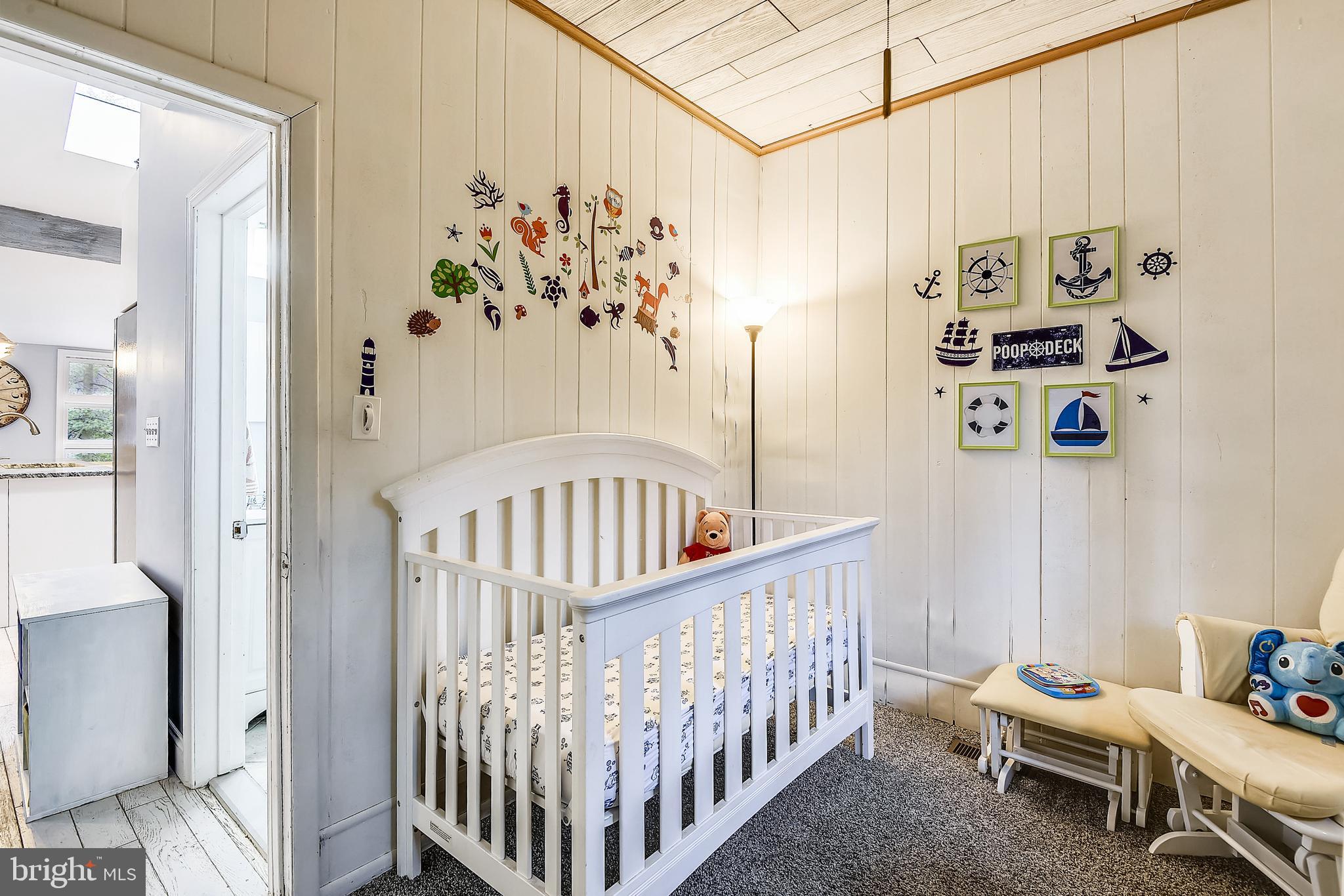 232 Nottingham Hill Annapolis, MD 21405 - Photo 26 of 70 a view of a bedroom with wooden floor and furniture
