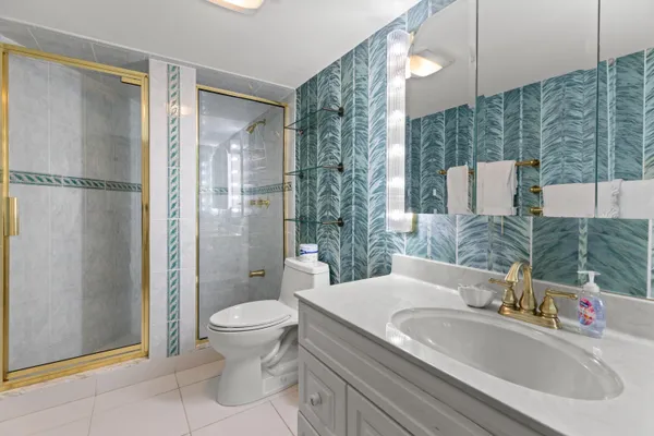 a view of a staircase with wooden floor