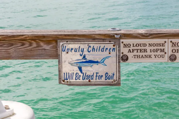 a kitchen with stainless steel appliances kitchen island granite countertop a stove and a refrigerator