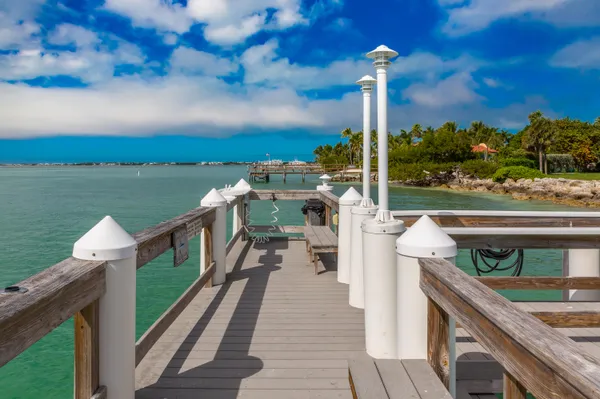 a view of a balcony with chairs