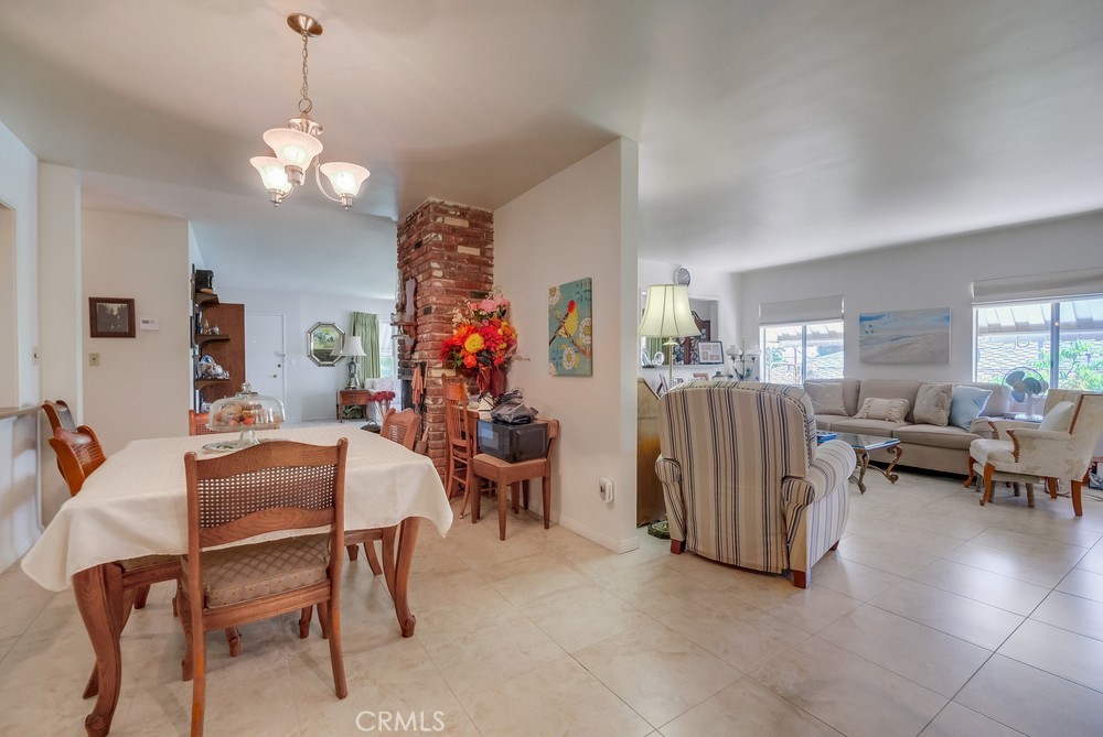 4329 Canyon Crest Road Altadena, CA 91001 - Photo 12 of 29 a view of a dining room with furniture and a chandelier