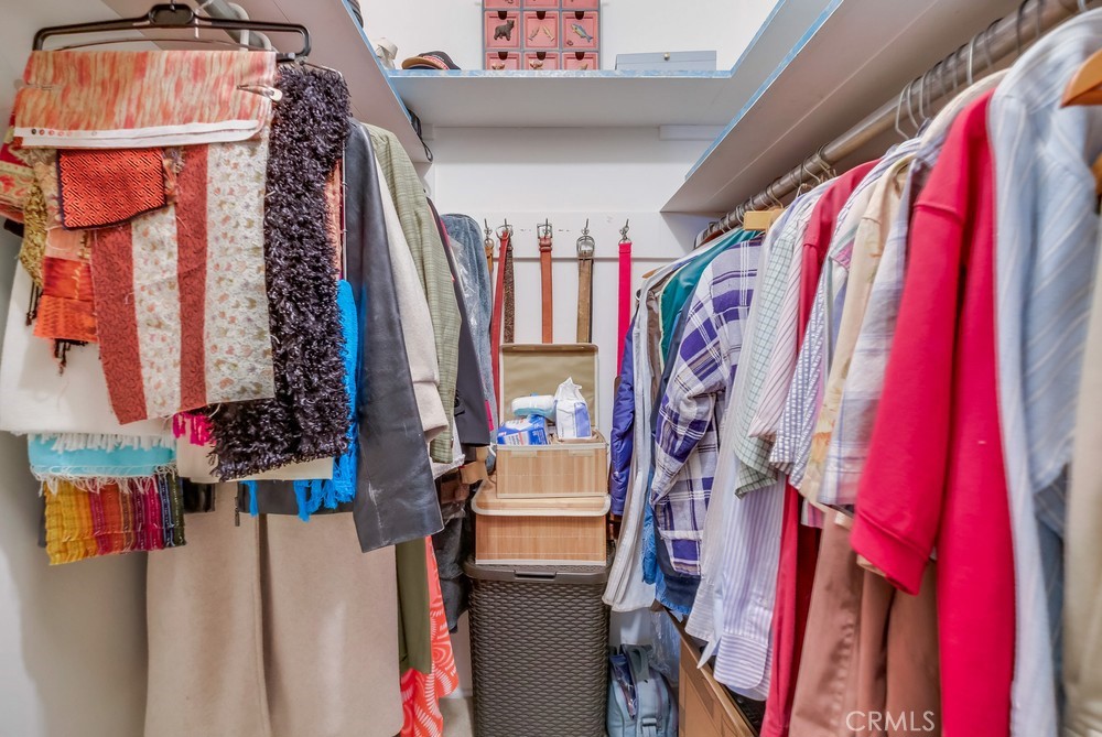 4329 Canyon Crest Road Altadena, CA 91001 - Photo 20 of 29 a view of walk in closet with clothes and shoes