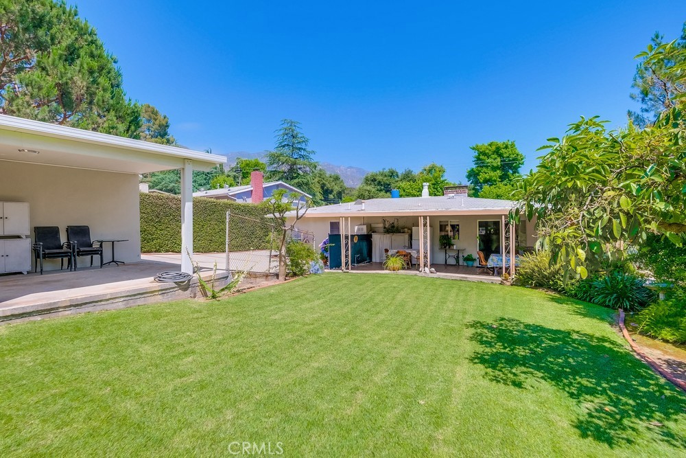 4329 Canyon Crest Road Altadena, CA 91001 - Photo 26 of 29 a view of house with backyard and patio