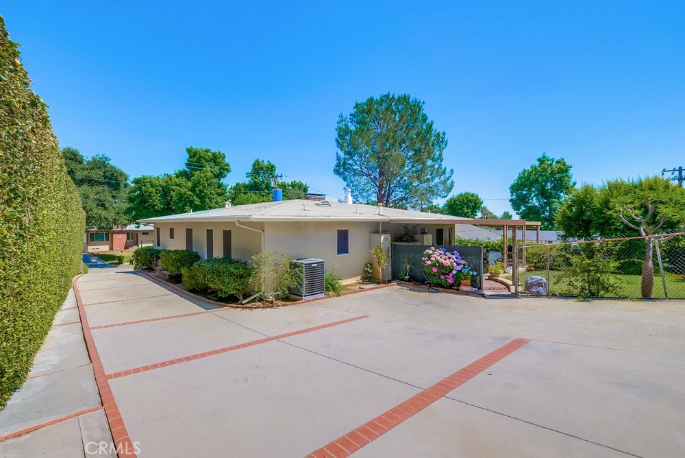 4329 Canyon Crest Road Altadena, CA 91001 - Photo 28 of 29 a view of a house with a garden and pathway