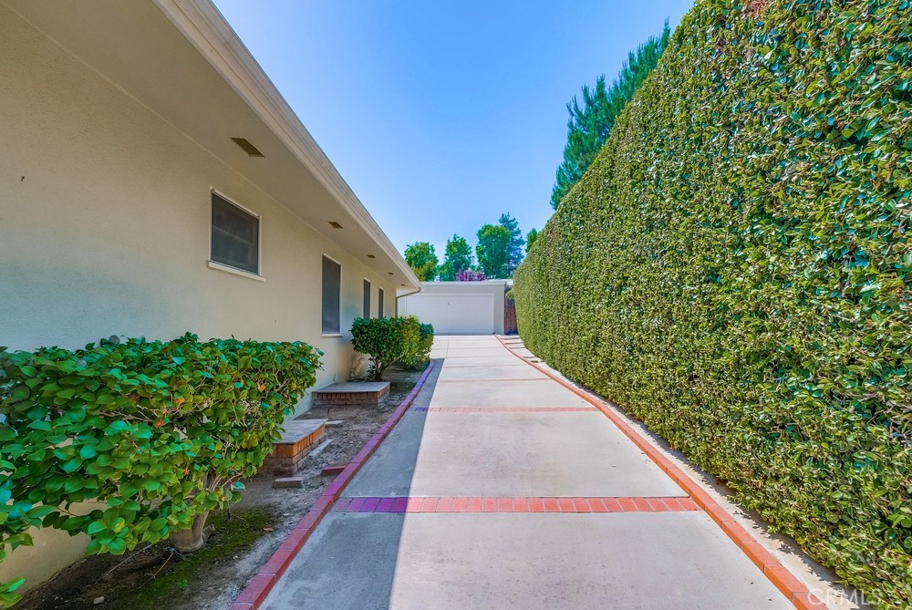 4329 Canyon Crest Road Altadena, CA 91001 - Photo 29 of 29 a view of a house with a yard