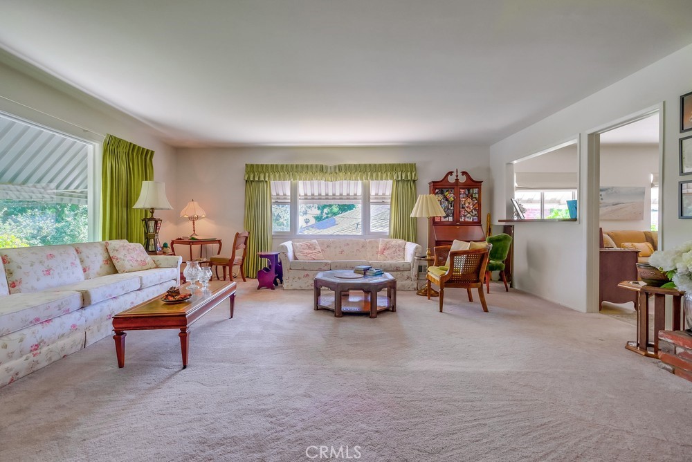 4329 Canyon Crest Road Altadena, CA 91001 - Photo 6 of 29 a living room with furniture and a potted plant