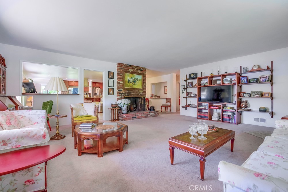 4329 Canyon Crest Road Altadena, CA 91001 - Photo 7 of 29 a living room with furniture and a flat screen tv