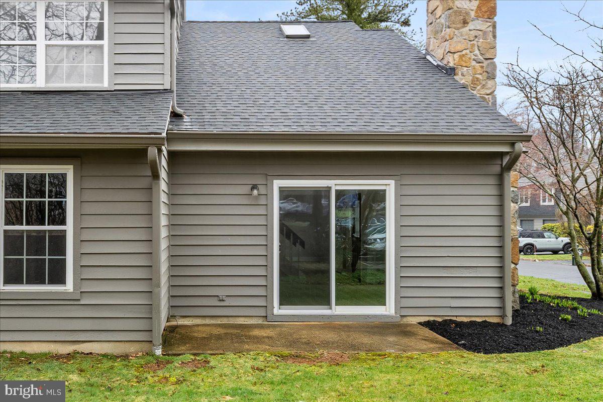 21 Andover Circle Princeton, NJ 08540 - Photo 29 of 31 a front view of a house with a yard and garage