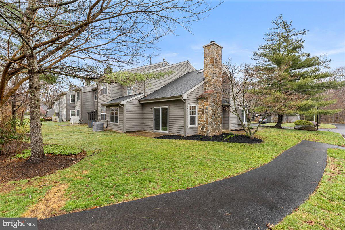 21 Andover Circle Princeton, NJ 08540 - Photo 31 of 31 a view of a house with backyard and tree