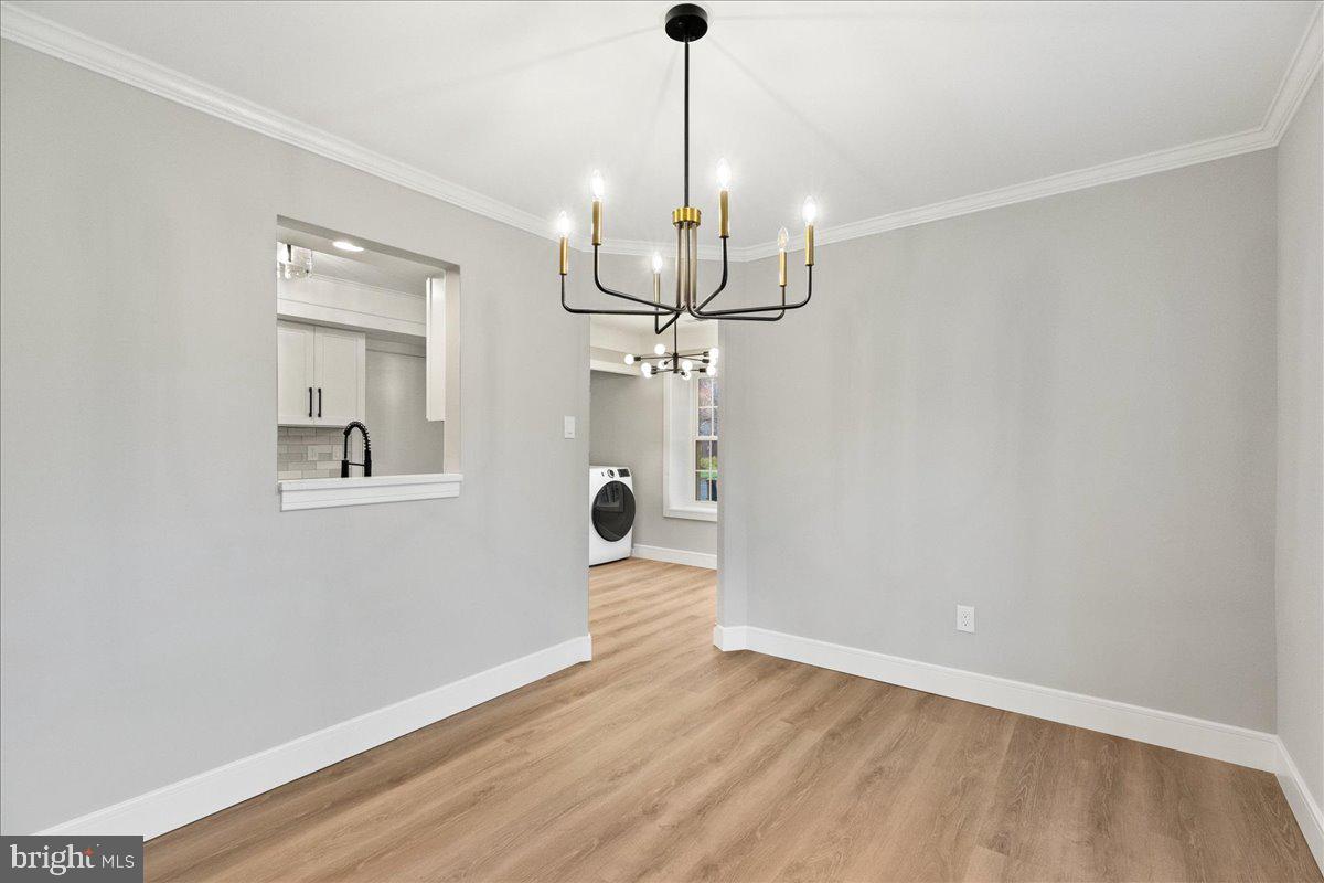 21 Andover Circle Princeton, NJ 08540 - Photo 8 of 31 a view of empty room with wooden floor and ceiling fan