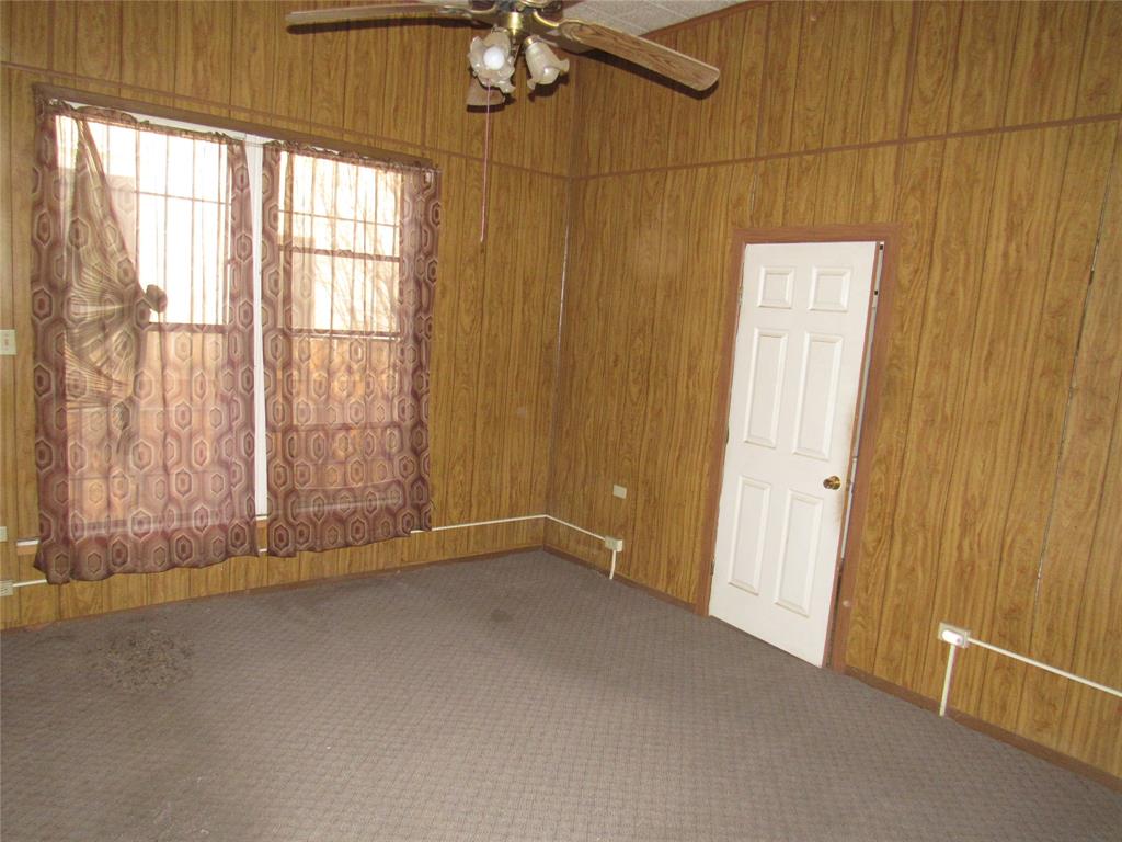 1622 North 6th Street Waco, TX 76707 - Photo 11 of 17 an empty room with windows
