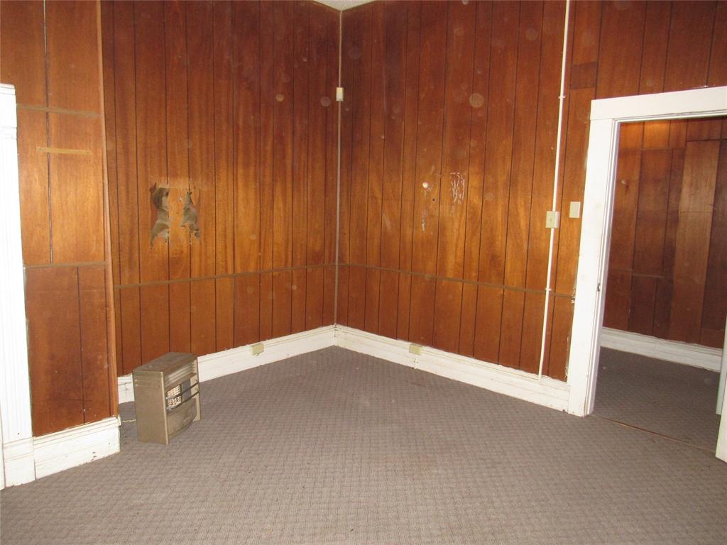 1622 North 6th Street Waco, TX 76707 - Photo 17 of 17 a view of an empty room with wooden walls