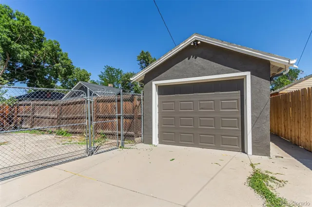 a front view of a house with a garage