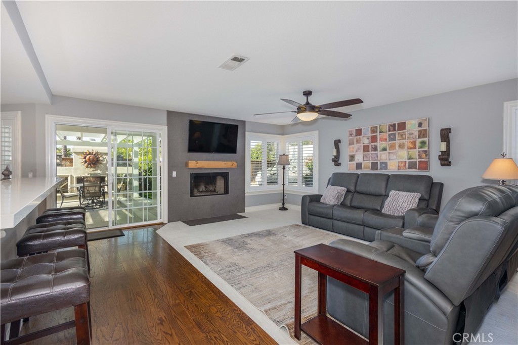 31858 Valone Court Temecula, CA 92591 - Photo 14 of 45 a living room with furniture and a fireplace