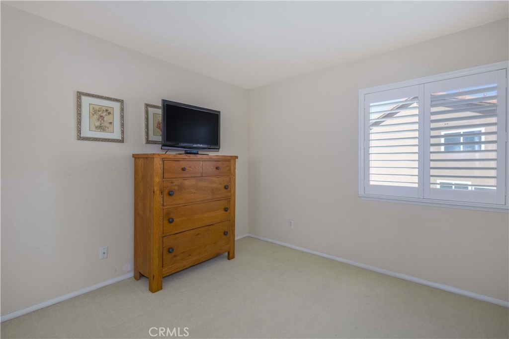 31858 Valone Court Temecula, CA 92591 - Photo 22 of 45 a living room with furniture and a flat screen tv