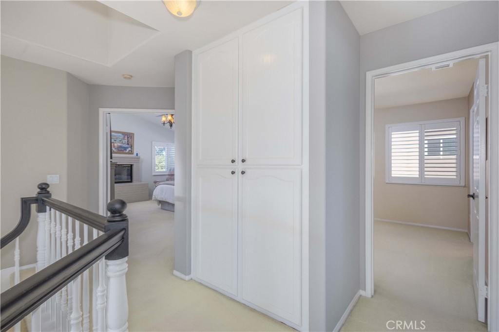 31858 Valone Court Temecula, CA 92591 - Photo 23 of 45 a view of a hallway and a livingroom with furniture