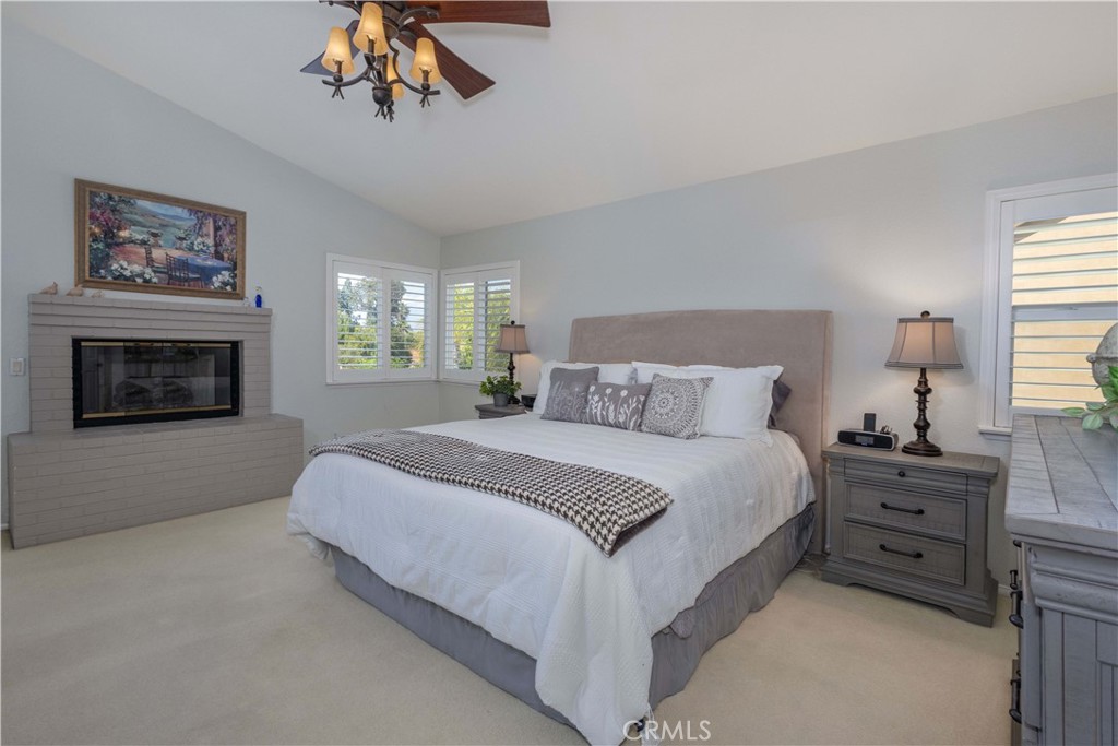 31858 Valone Court Temecula, CA 92591 - Photo 24 of 45 a spacious bedroom with a bed a dresser next to a window