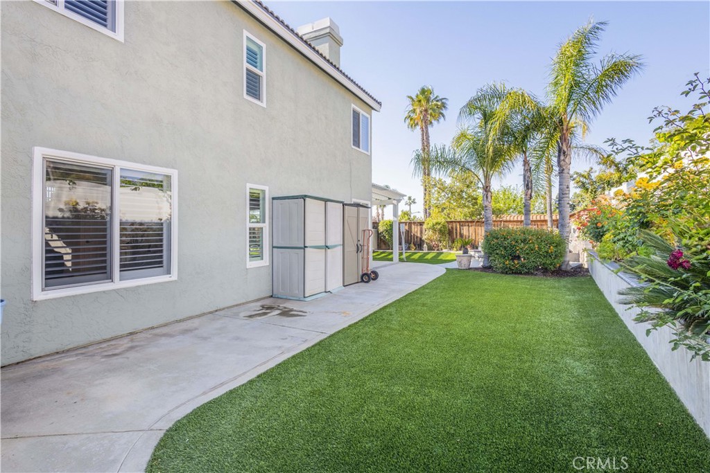 31858 Valone Court Temecula, CA 92591 - Photo 37 of 45 a view of house with backyard and a garden