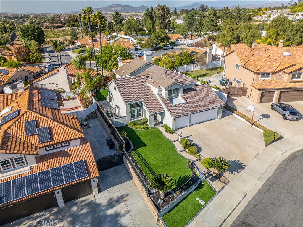31858 Valone Court Temecula, CA 92591 - Photo 39 of 45 an aerial view of a house with a yard basket ball court and outdoor seating