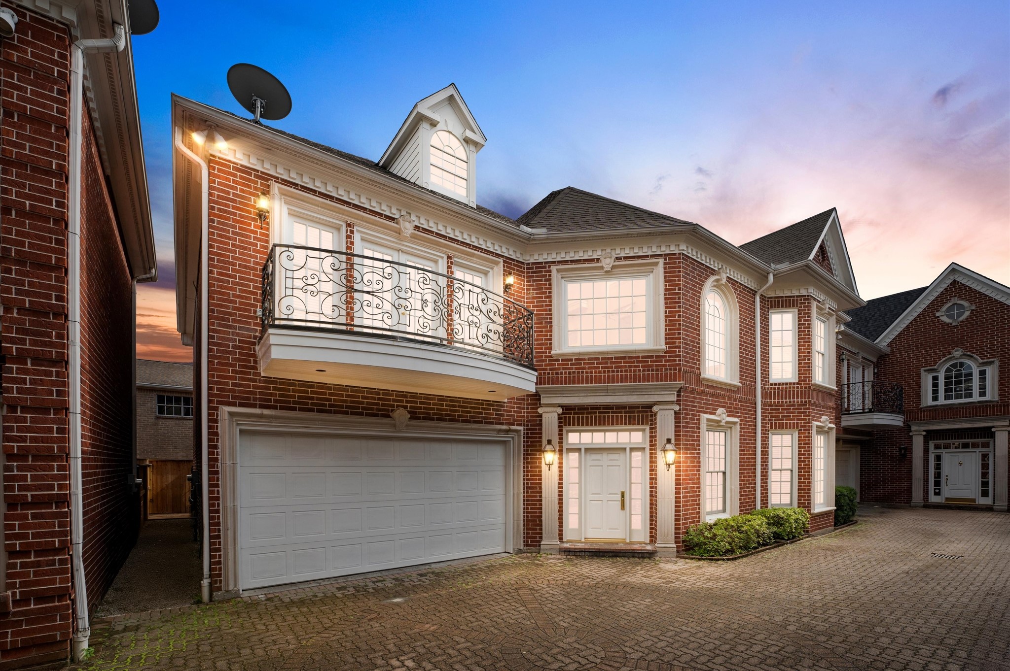 a front view of a house with a garage