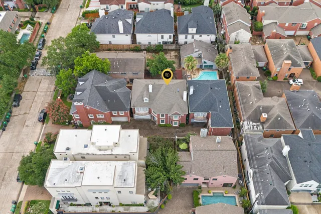 an aerial view of a city with lots of buildings
